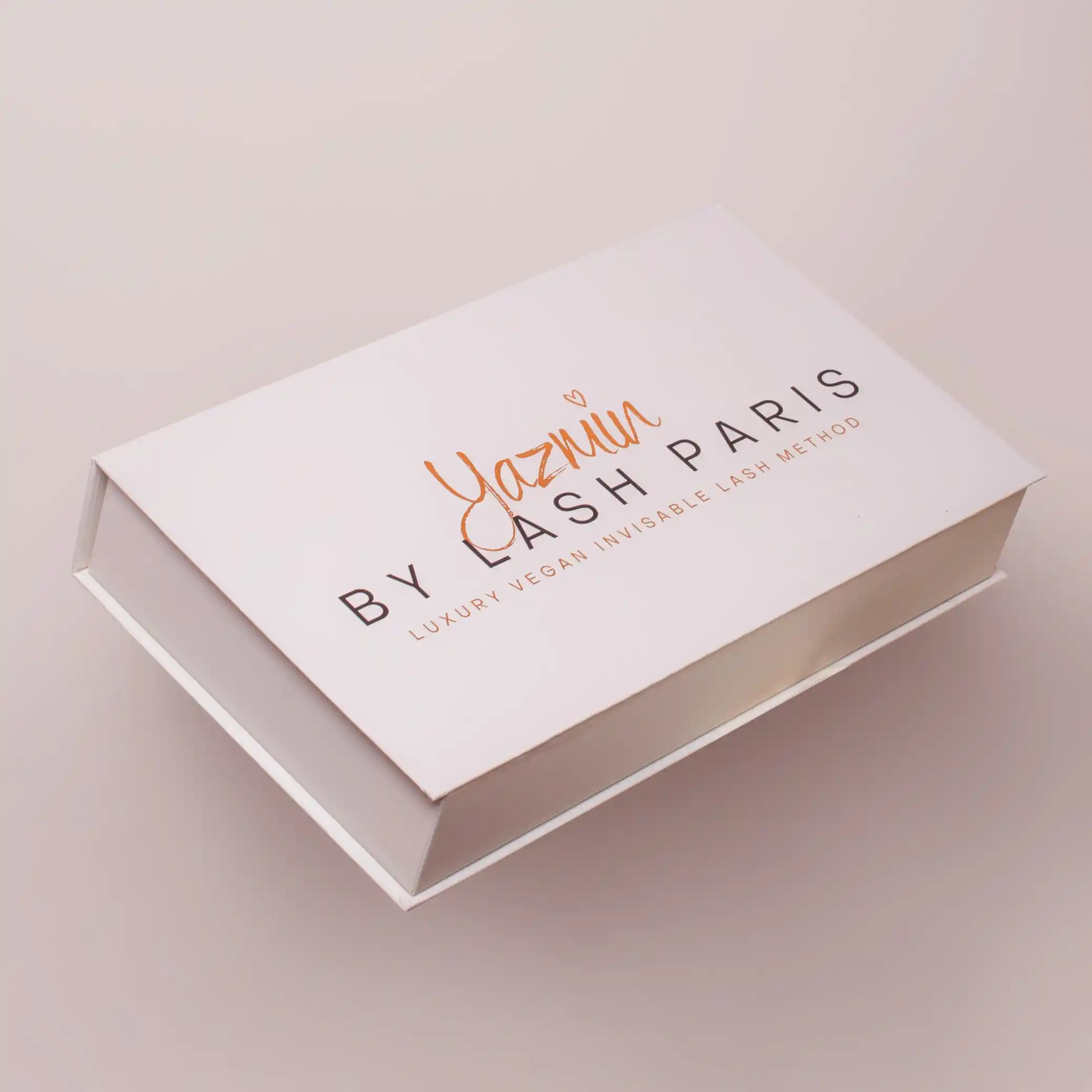 White Yazmin by Lash Paris magnetic lash box with orange script logo